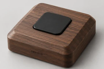 Square walnut monolith with a square button