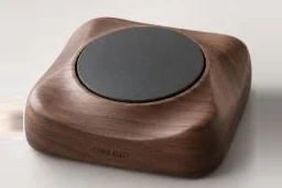 Soft square walnut form with a black button